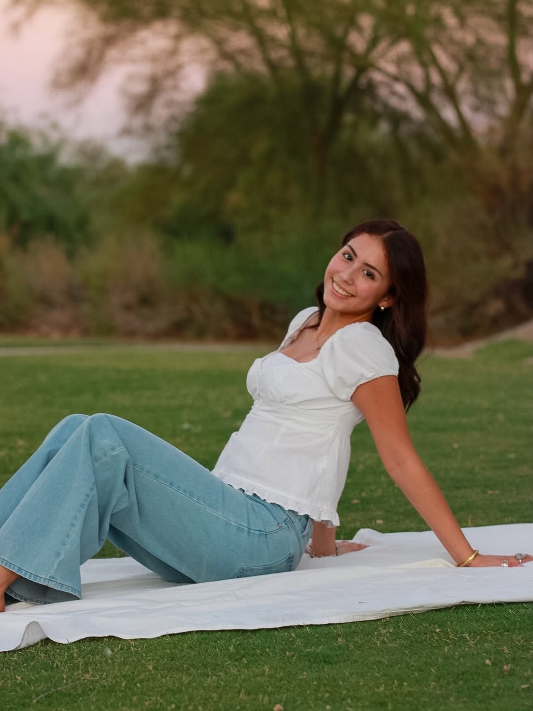 Portrait of a woman outdoors at golden hour